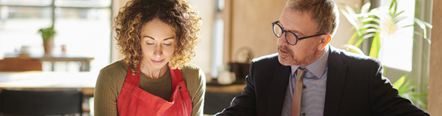 A business owner consulting with an advisor