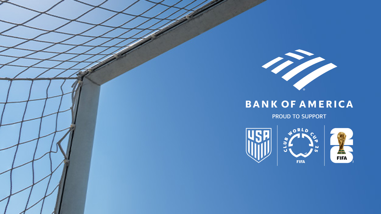 Blue skies beneath a soccer goal 